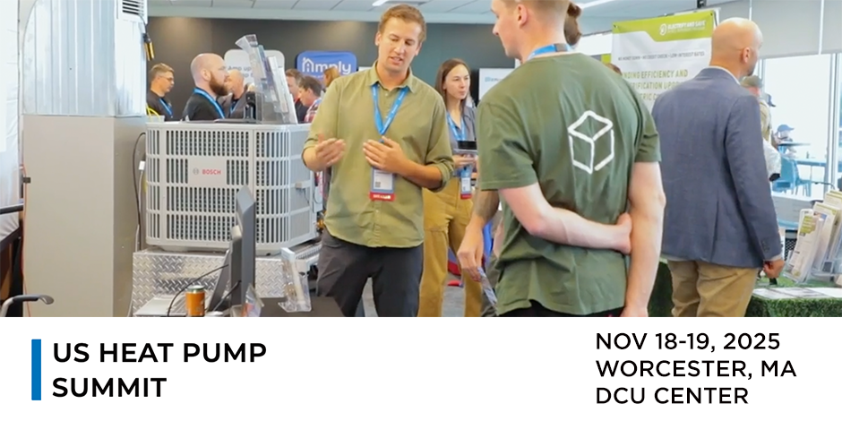 people having a talk next to a heat pump at the 2024 US Heat Pump Summit
