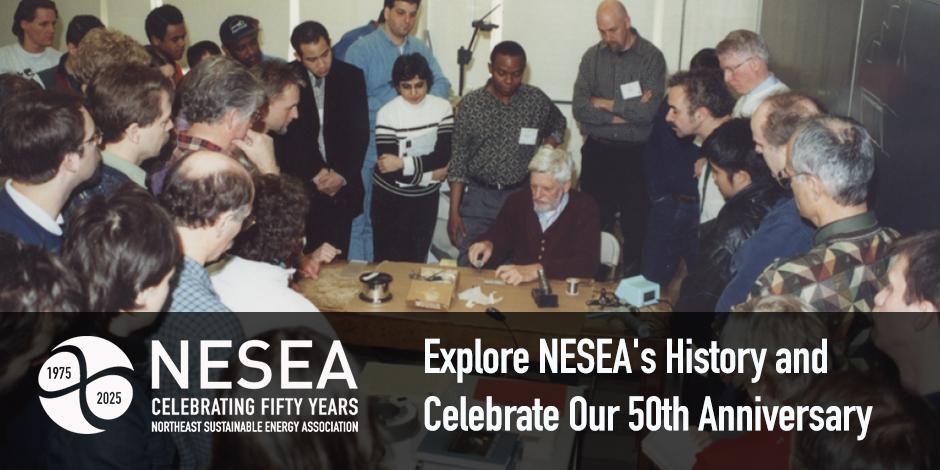 people gathered around someone demonstrating some technology, in the 1980s